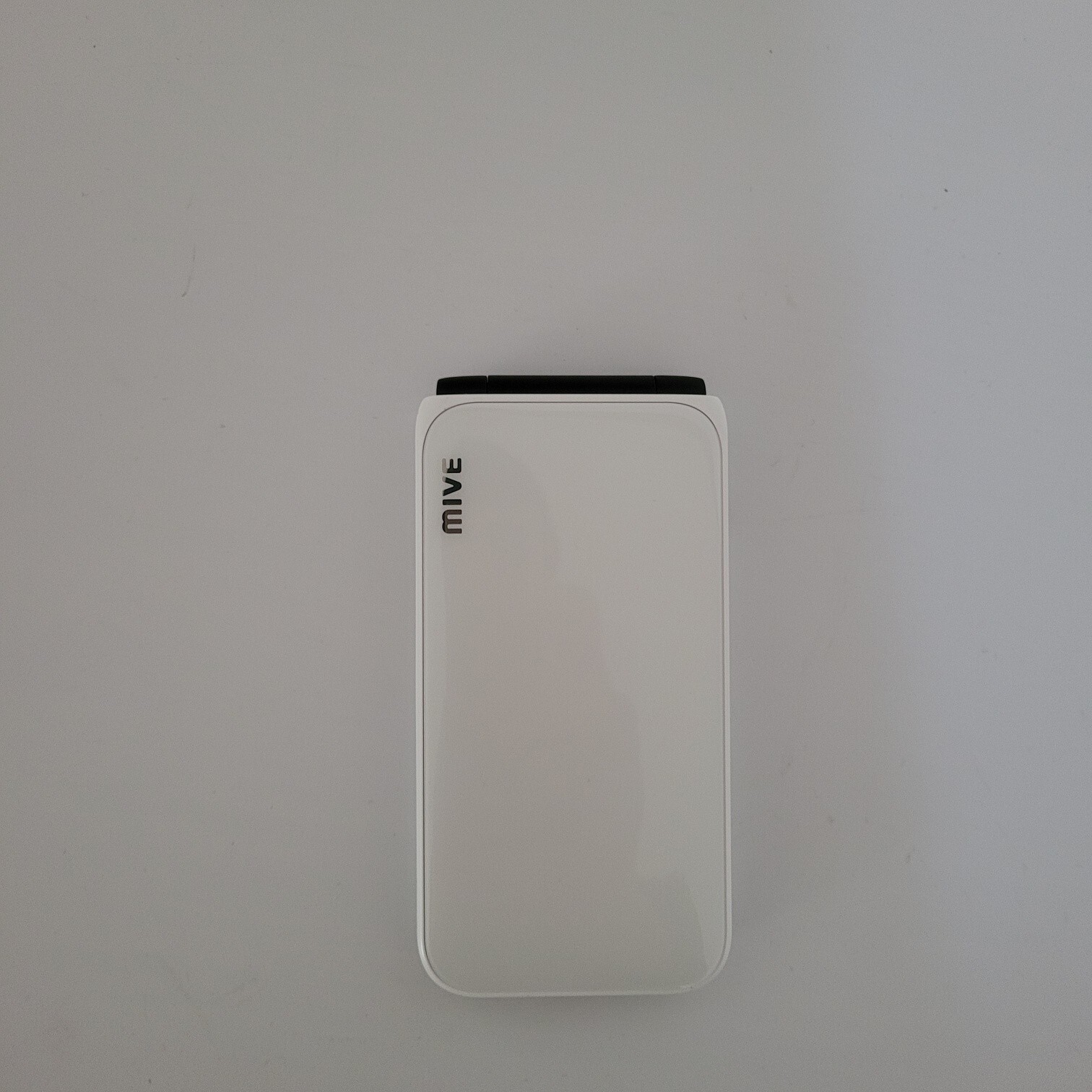 ALT MIVE AT-M120 Style Folder cell phone 32GB LTE/3G – White Unlocked