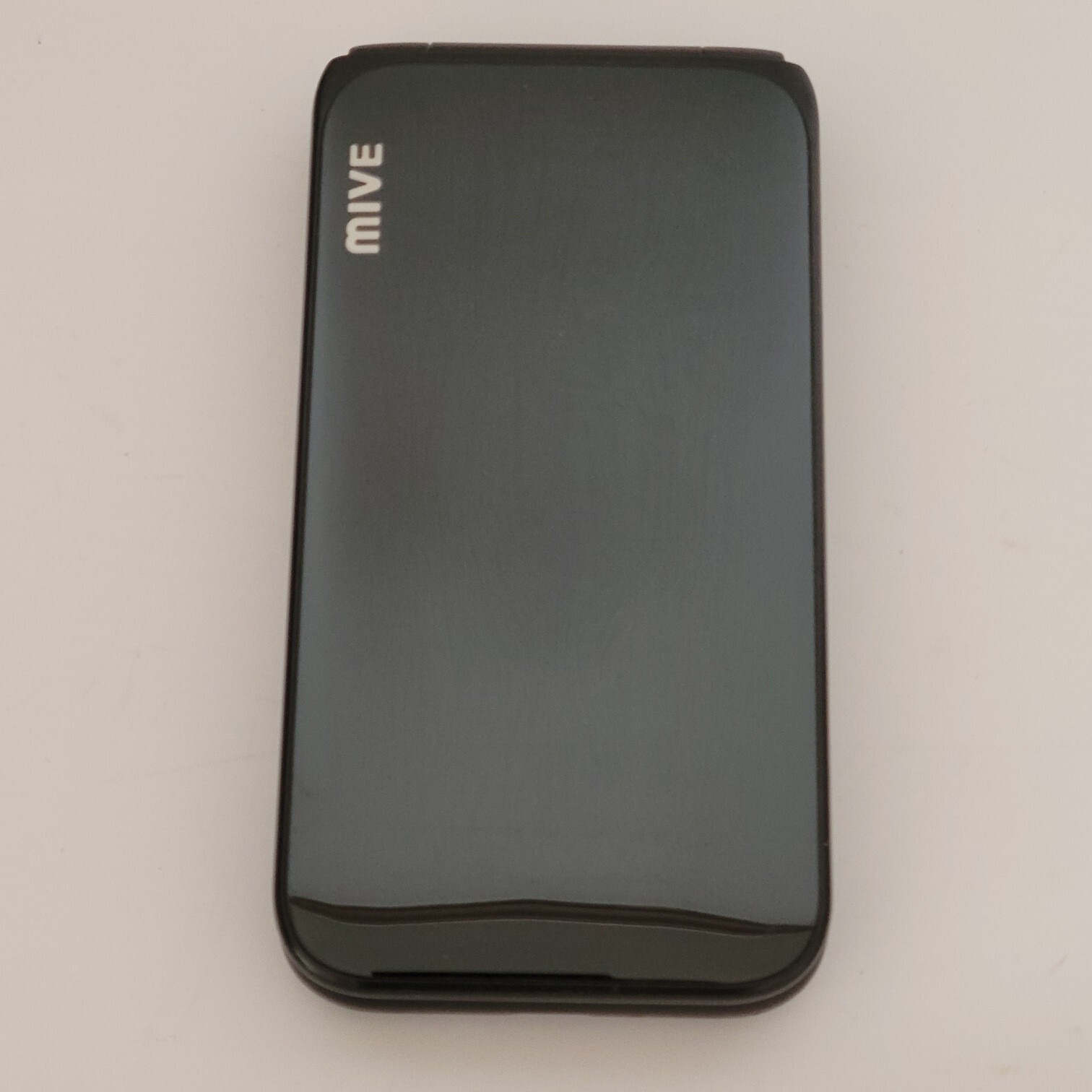 ALT MIVE AT-M120 Style Folder cell phone 32GB LTE/3G – Black Unlocked