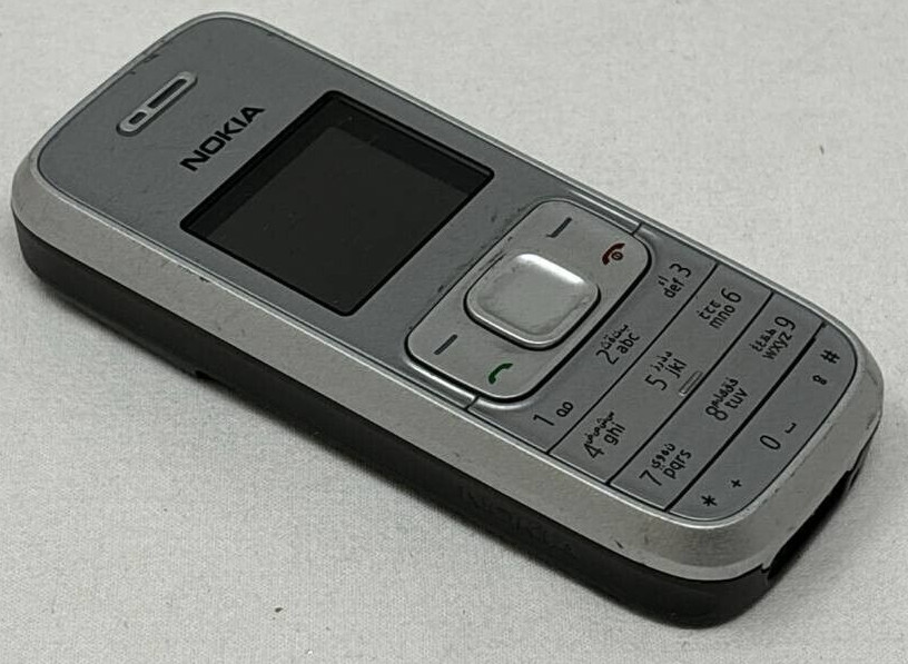 Nokia 1209 Vintage Cell Phone Bar Keyboard Slim GSM MP3 MicroSD 2.5mm Jack OEM